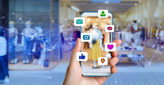 Social media icons over a phone