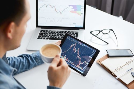 man reviewing his investments